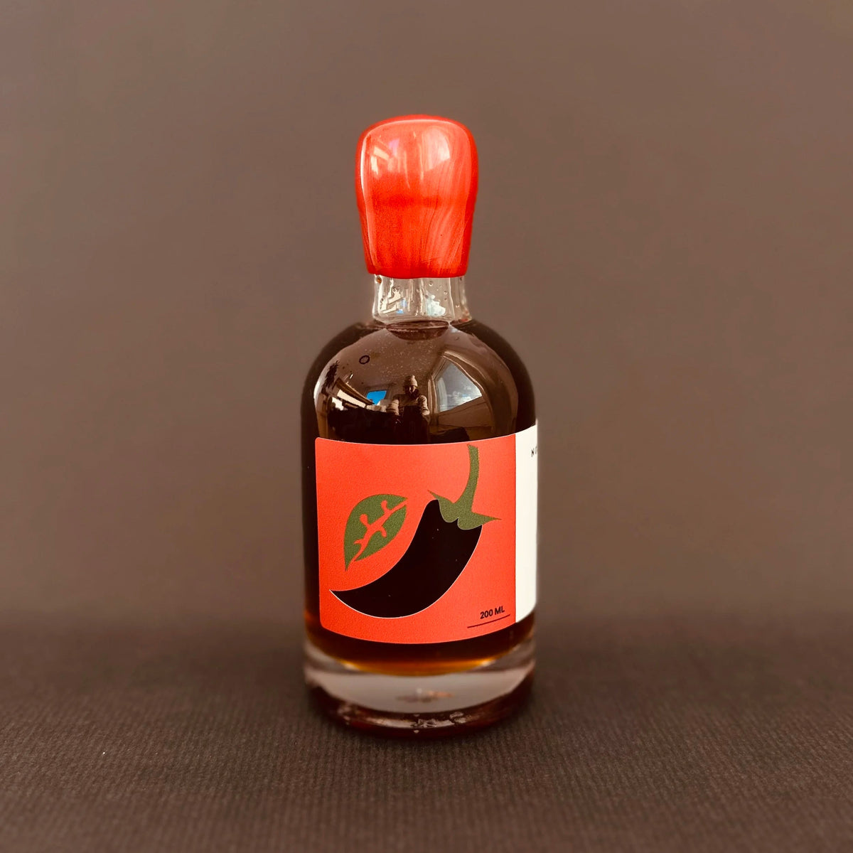 Sirop d’érable fumé et infusé aux piments forts
